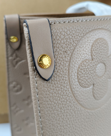 Lou Vton Onthego MM Handbag