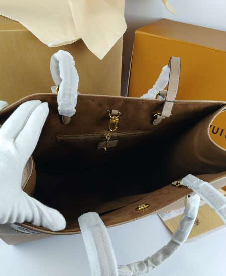 Lou Vton Onthego MM Handbag